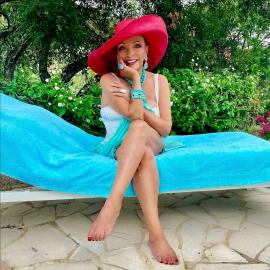 Joan Collins Shows Off Her Fierce and Fabulous Swimsuit Style at 92