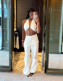 Simone Biles Shows Off Abs and Belly Button Piercing in Crop Top and Pants