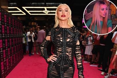 Christina Aguilera Channels 'Dirrty' Era in Racy T-Shirt and Fishnet Outfit