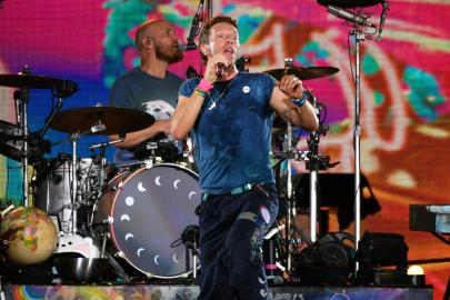 Chris Martin's Kiss Cam Antics with Coldplay Explained