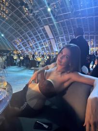 Hailey Bieber Shows the Reality of Sitting in a Corseted Gown at Museum Gala