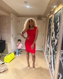 Serena Williams' Daughter Photobombs Her as She Poses in a Leggy Red Dress