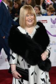 Susan Boyle Debuts Dramatic Red Carpet Makeover at Awards Show