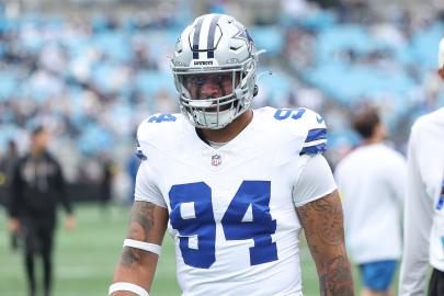 Cowboys Stars Leave Flowers at Marshawn Kneeland's Locker After His Death